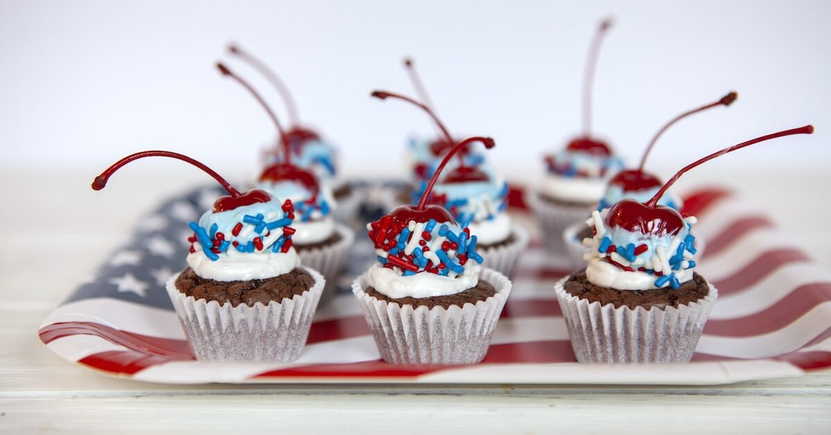 Add a *POP* to your 4th of July or Memorial Day party with these colorful Red White and Blue Cherry Bomb Mini Cupcakes! Click for step by step photo instructions.