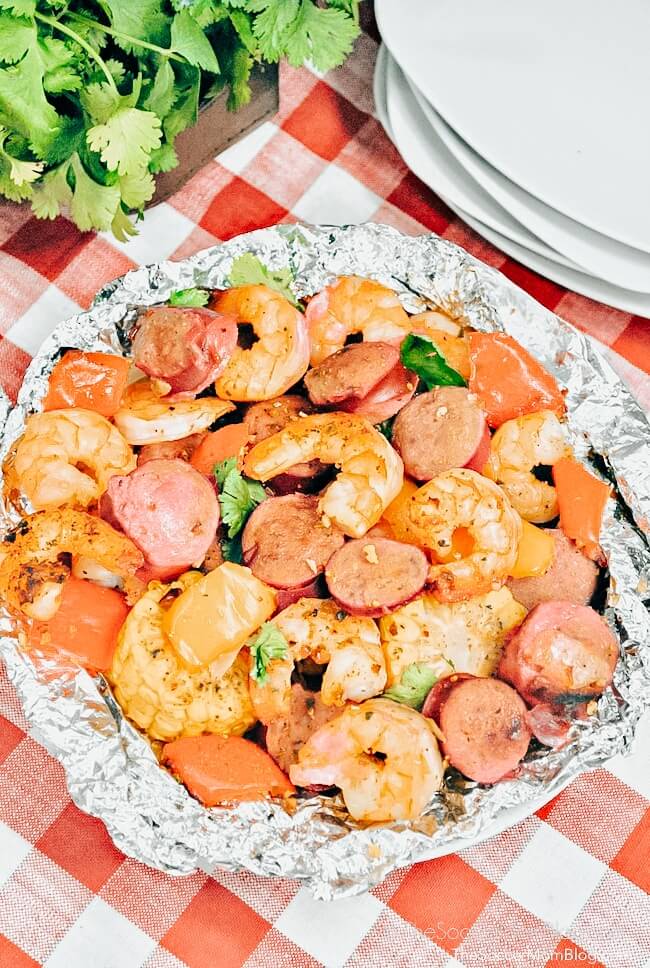 foil packet filled with cajun seasoned shrimp, sausage, and vegetables