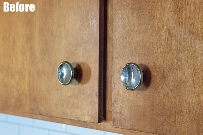 Wooden kitchen cabinets with old knobs