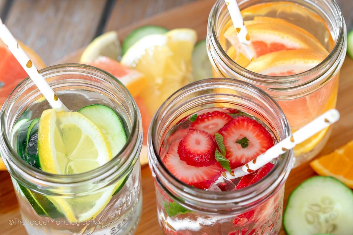 top down view of 3 mason jars of fruit spa water.