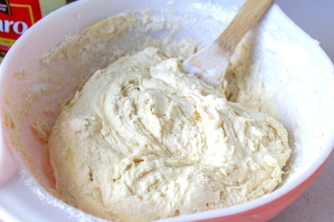 cinnamon roll batter in mixing bowl