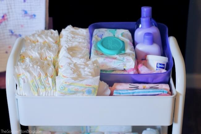 baby changing cart with diapers and wipes