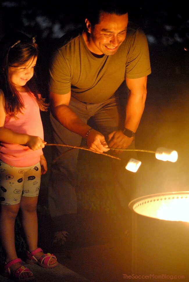 roasting marshmallows over the Solo Stove backyard fire pit