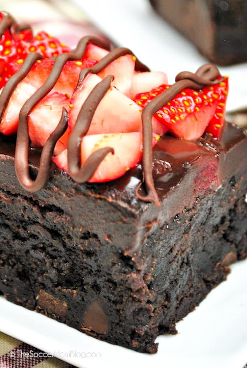 close up of a chocolate covered strawberry brownie