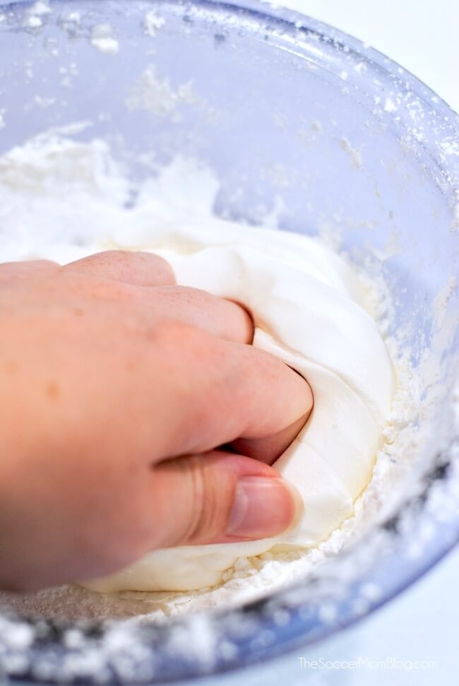Kneading marshmallow slime by hand