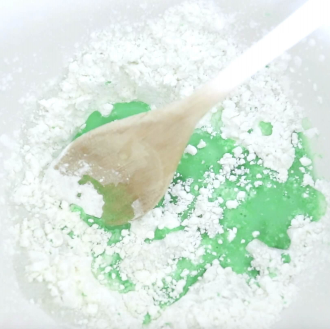 mixing Jello and cornstarch to make slime