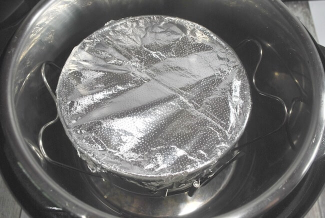 Instant pot apple cake wrapped in foil before cooking