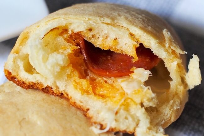 West Virginia Pepperoni Rolls are warm, flaky, and stuffed with spicy pepperoni and cheese. You've got to try them to see why they're famous here!
