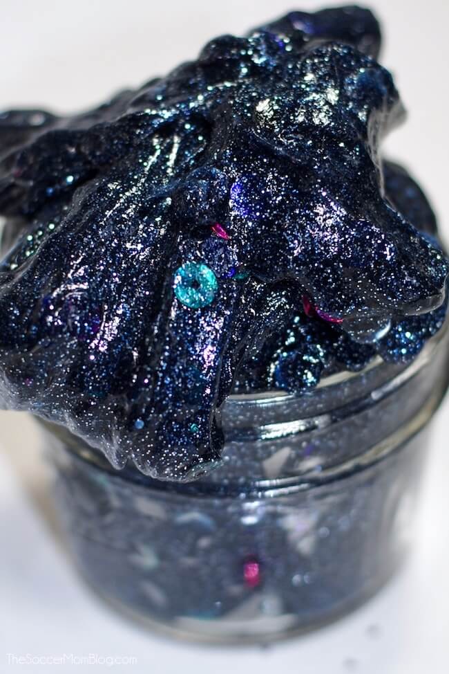 glittery black galaxy slime in jar