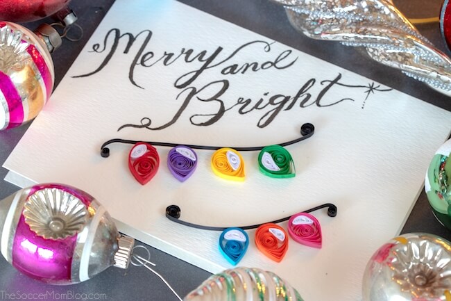 A simple, yet beautiful Quilled Christmas Lights Card that is easy enough for beginners to make. Step-by-step video and photo tutorial inside.