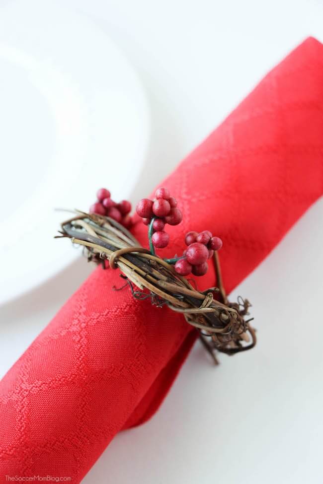 Add a festive touch to your holiday table with these gorgeous nature-inspired DIY Christmas Wreath Napkin Rings. This easy homemade table decor idea takes only minutes to make!