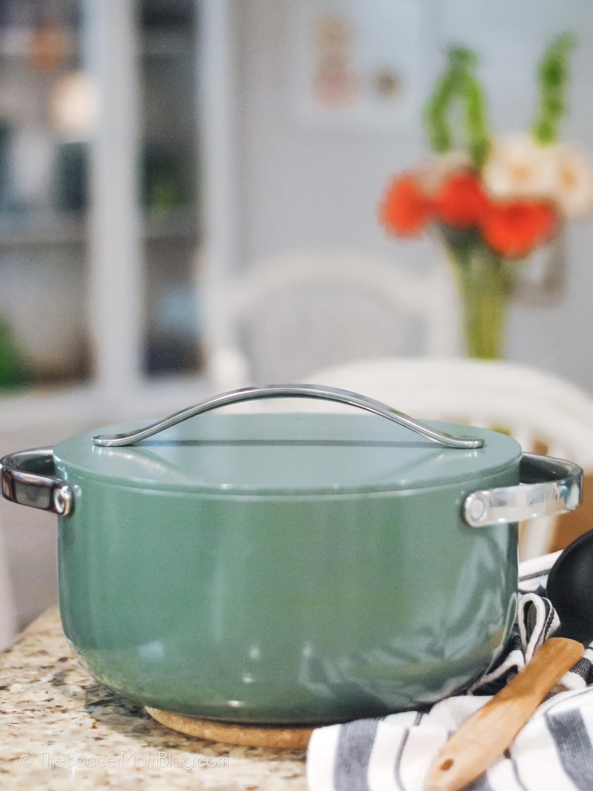 Caraway Cookware Dutch oven pot in a kitchen setting