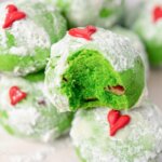 bright green Grinch Christmas cookies on plate
