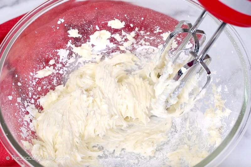 creaming butter and powdered sugar with hand mixer