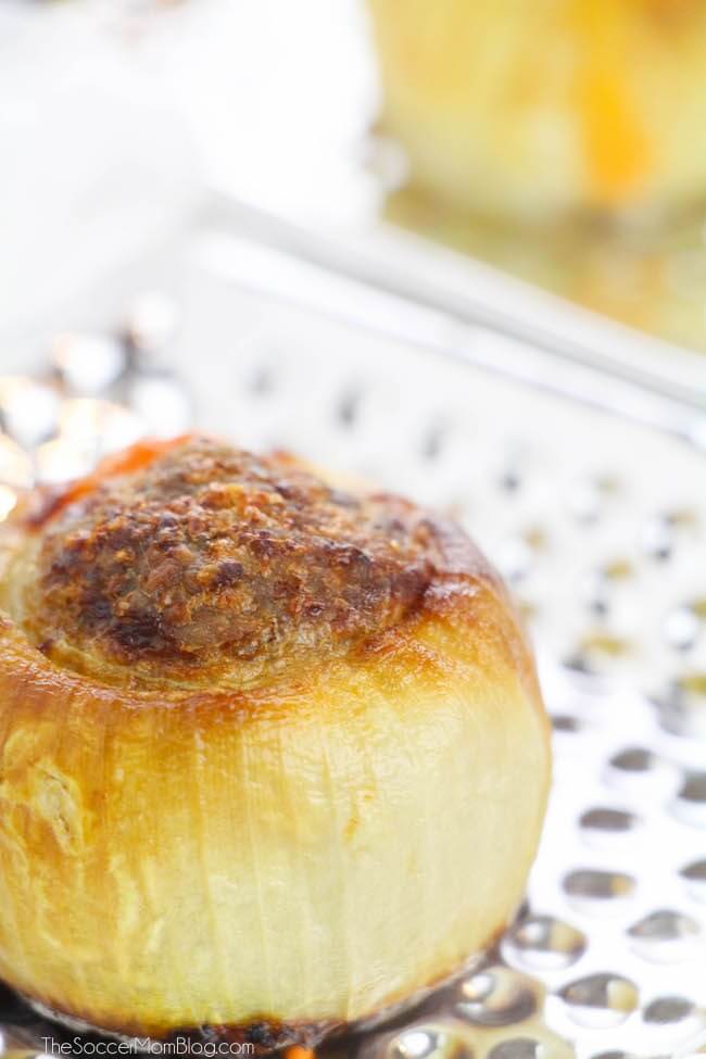 Keto Stuffed Onion Bombs are overflowing with delicious meat and cheese — can you believe you can eat something so amazing on a "diet"?!
