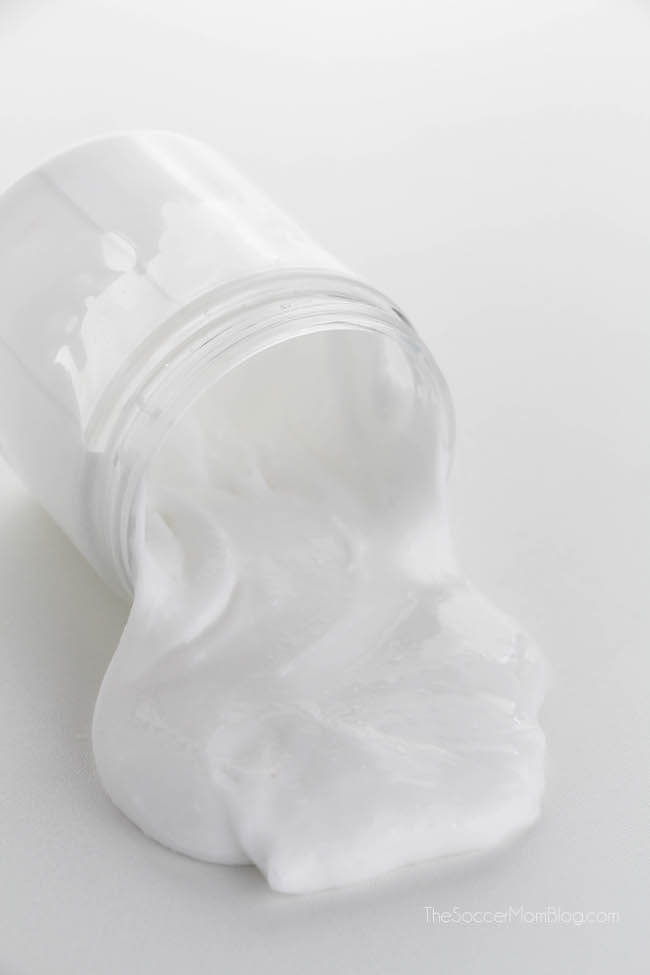 white glue slime oozing out of a jar