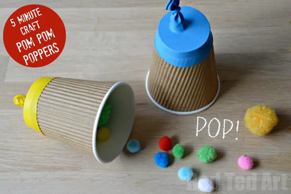 paper cup party popper with pom poms
