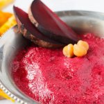Stunning and healthy! This Roasted Beet Hummus recipe is a bright update on a classic Mediterranean appetizer.