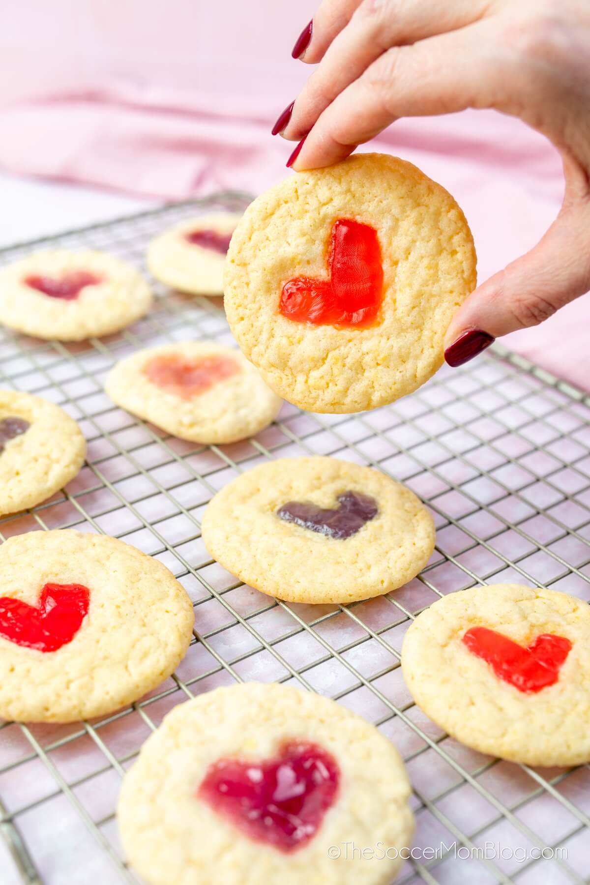 heart thumbprint cookies filled with a gummy bear melted.