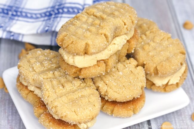 Soft peanut butter cookies filled with luscious peanut butter cream — these Homemade Nutter Butter cookies might just be better than the "real" thing!