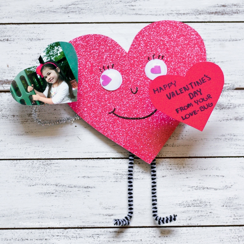 3D love bug Valentine craft surrounded by candy hearts