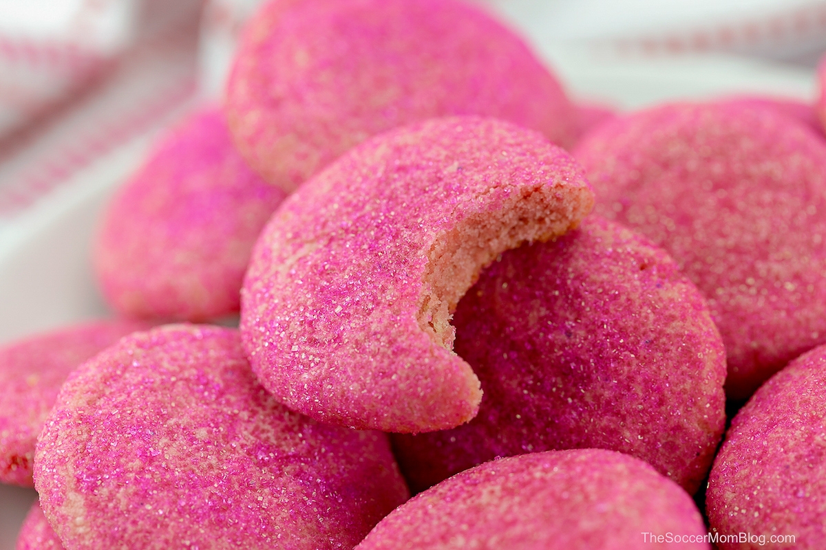 pile of strawberry champagne cookies with pink sprinkles