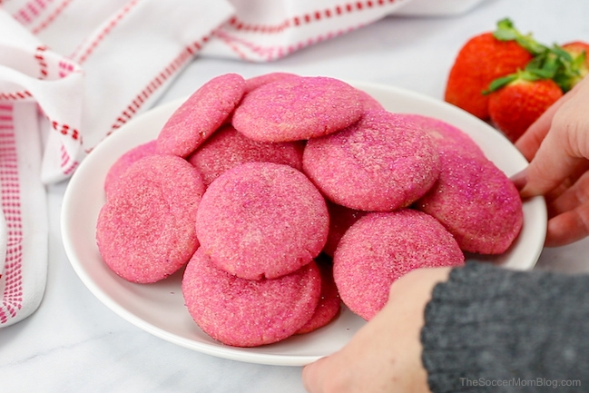 plate of strawberry champagne cookies with pink sprinkles