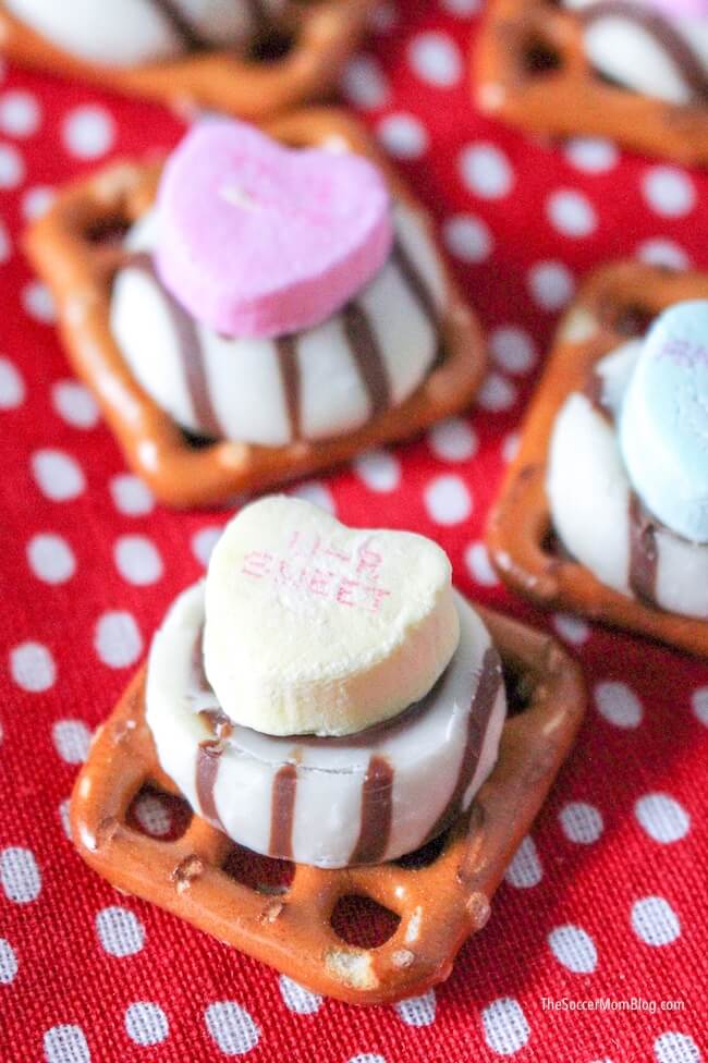 A quick and easy Valentine's Day party snack that's ready in minutes! These cute Valentine Pretzel Treats are fun for kids to make and perfect gifts for teachers, family and friends.