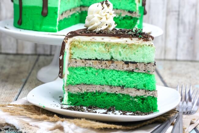 This gorgeous green Mint Chocolate Cake is a show-stopping layer cake perfect for St. Patrick's Day or Oreo fans! One of our favorite holiday recipes ever!