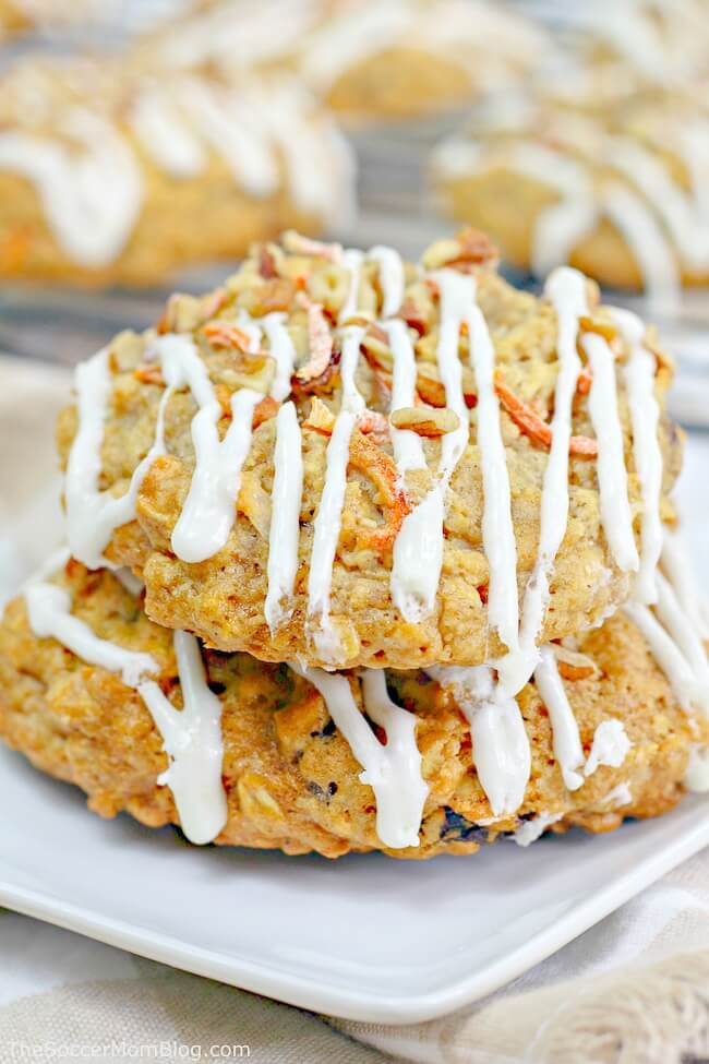 carrot cake oatmeal cookies stacked on a plate