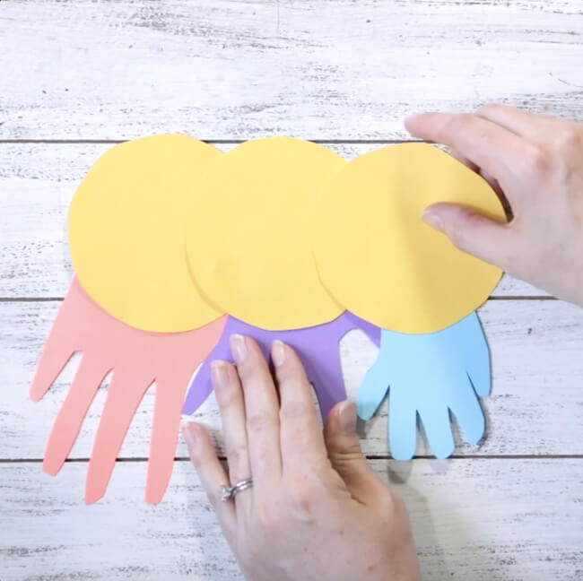 This handprint caterpillar craft is a cute kid-made gift for parents, grandparents, and family!