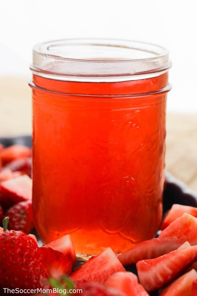 This Homemade Strawberry Moonshine is the perfect drink for any backyard party!