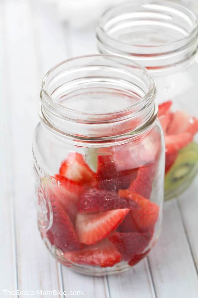 This Homemade Strawberry Moonshine is the perfect drink for any backyard party!