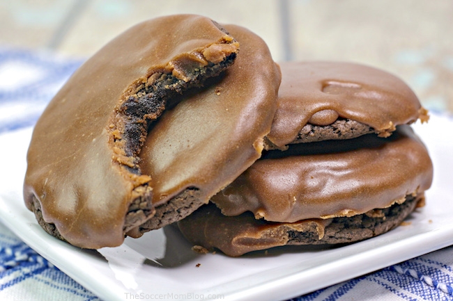 stack of chocolate cookies with chocolate icing.