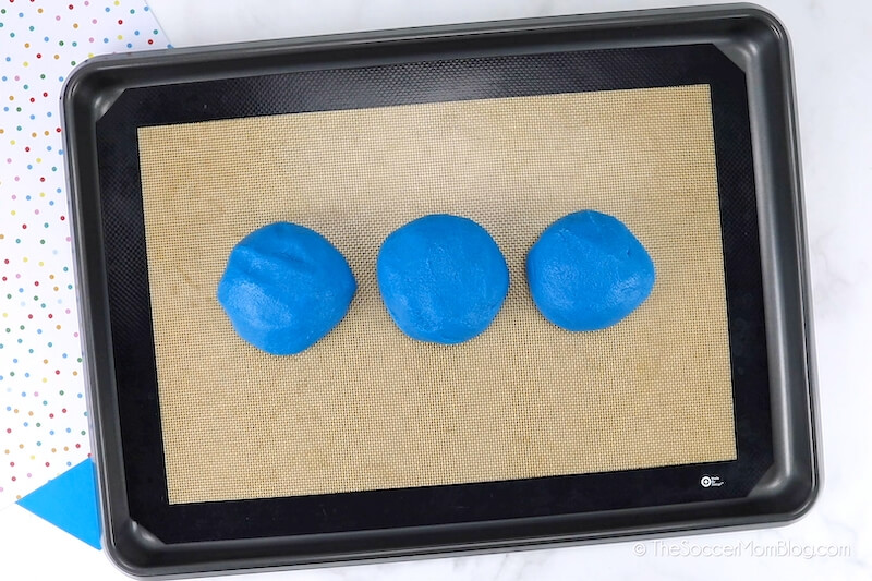 making balls of blue salt dough
