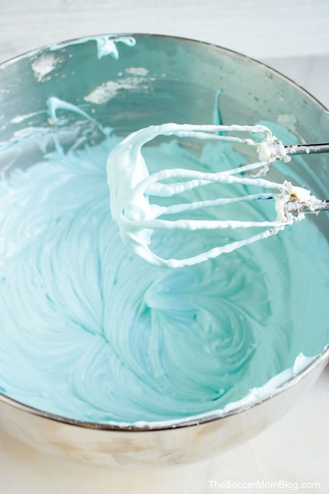 blue cheesecake batter in mixing bowl