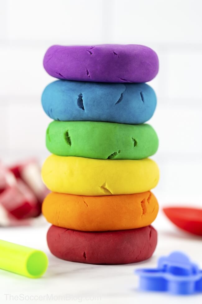 stack of rainbow colored balls of play dough