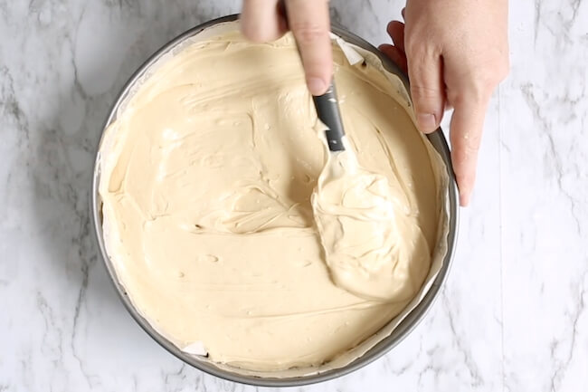 peanut butter cheesecake batter in pan