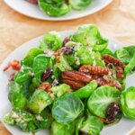 Fresh, crispy, sweet, and savory, this Brussels Sprout Salad with Bacon is miles above other salads! And the sweet Poppyseed Vinaigrette is absolutely amazing! The best part is that you can whip up this delicious bacon and Brussel sprout salad in just a few minutes!