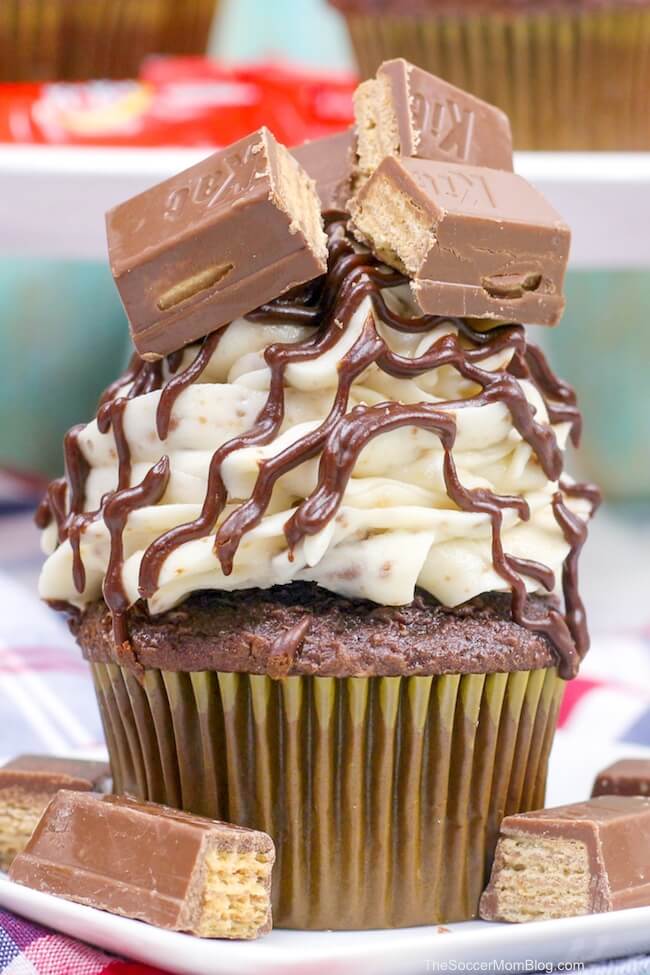 chocolate cupcakes topped with Kit Kat buttercream frosting