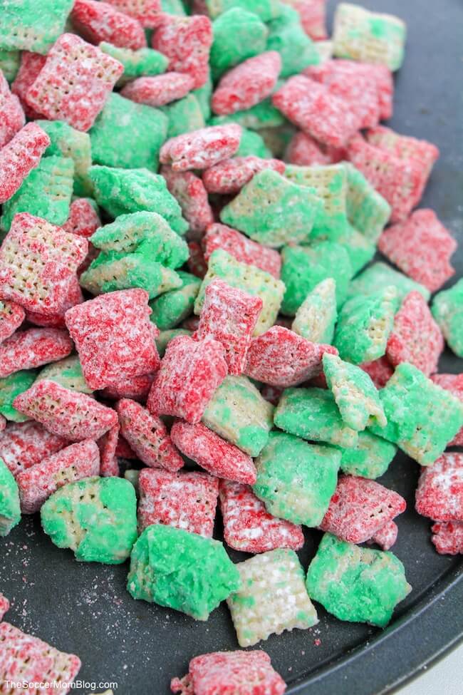 close up of Christmas puppy chow - red and green chex mix