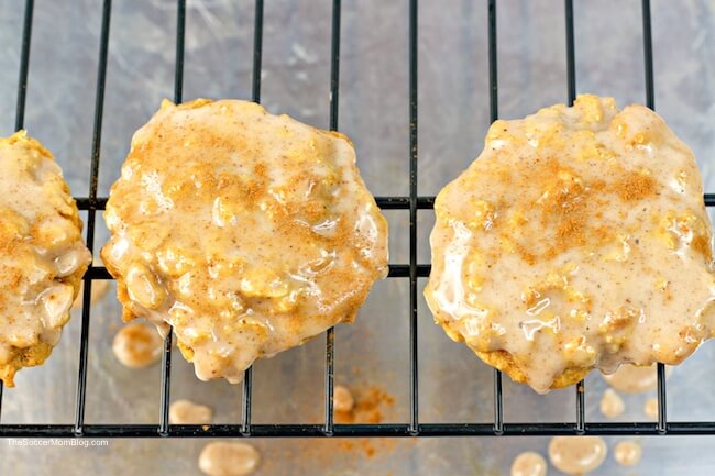 iced pumpkin cookies on wire cooling rack