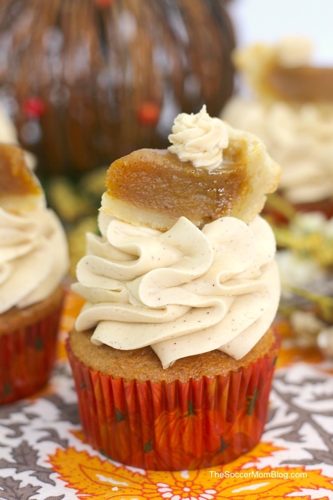 Made with real pumpkin and topped with a miniature slice of pumpkin pie, these pumpkin pie cupcakes are the cutest Thanksgiving dessert ever! And of course they're delicious too! 