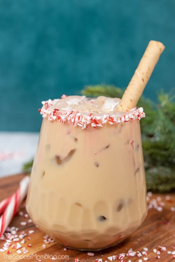 peppermint mocha cocktail with crushed candy canes on the glass
