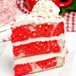 slice of red and white peppermint layer cake