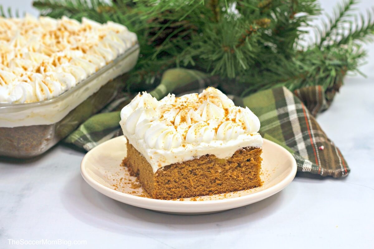 This moist gingerbread poke cake makes the perfect Christmas dessert! Every bite is a tantalizing blend of holiday spices and sweet creamy filling.