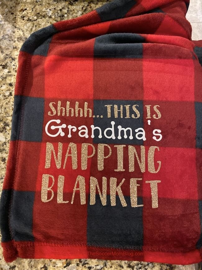 Personalized blankets make a great gift idea, but they can be quite pricey to purchase! We'll show you how to make your own DIY nap blanket and how to use heat transfer vinyl on fleece blankets with an easy step-by-step guide.