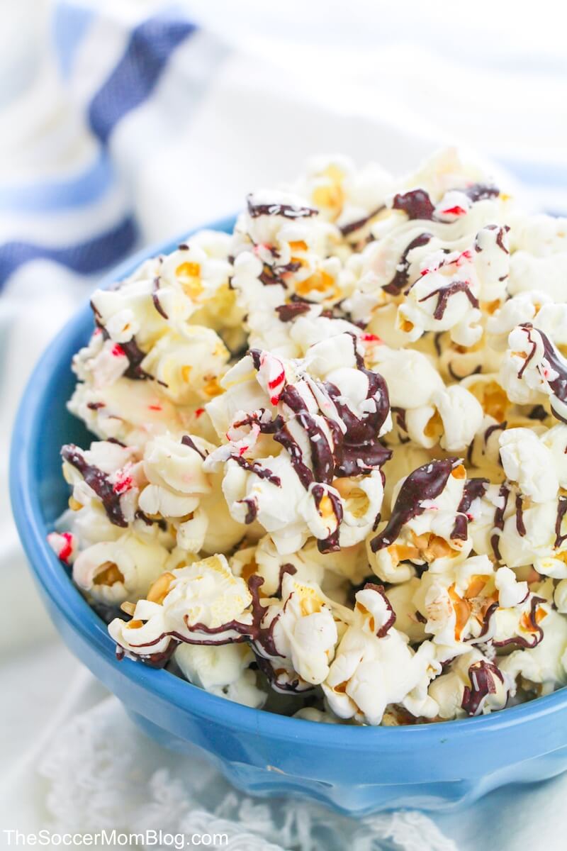 bowl of popcorn with peppermint bark coating.