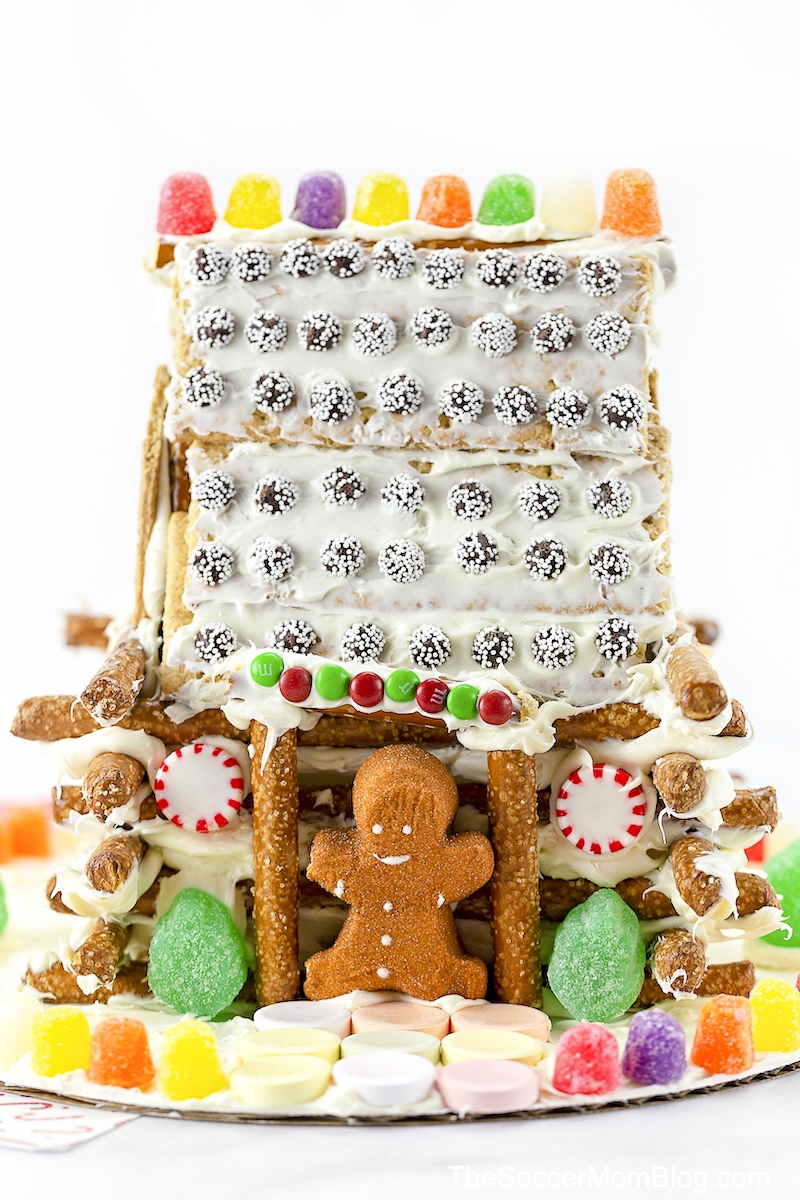 Like a gingerbread house, only better! This candy covered pretzel log cabin is easy for kids to make and delicious to eat!