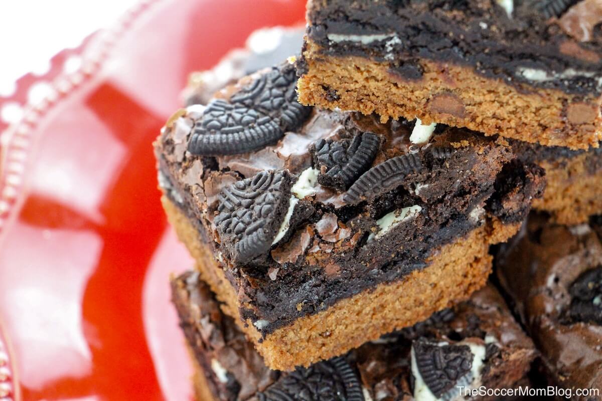 The most decadent dessert recipe ever...guaranteed!! Slutty brownies combine the best desserts of all time: chocolate chip cookies, OREOs, brownies into one big batch of amazingness!!